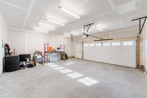 108 Masters Heights Se, Calgary, AB - Indoor Photo Showing Garage