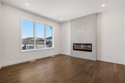 152 Sage Hill Heights Nw, Calgary, AB - Indoor Photo Showing Living Room With Fireplace