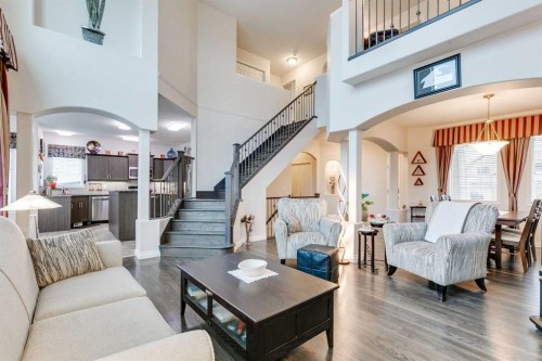 123 Springmere Place, Chestermere, AB - Indoor Photo Showing Living Room