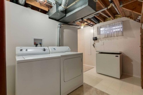 178 Windermere Road Sw, Calgary, AB - Indoor Photo Showing Laundry Room