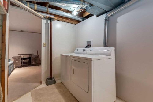 178 Windermere Road Sw, Calgary, AB - Indoor Photo Showing Laundry Room