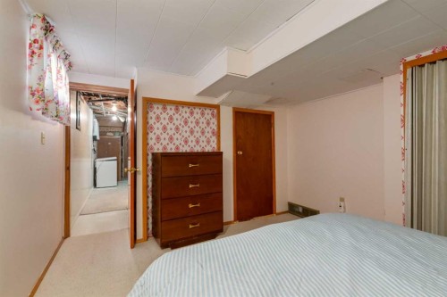 178 Windermere Road Sw, Calgary, AB - Indoor Photo Showing Bedroom