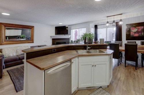 90 Royal Crest Point Nw, Calgary, AB - Indoor With Fireplace