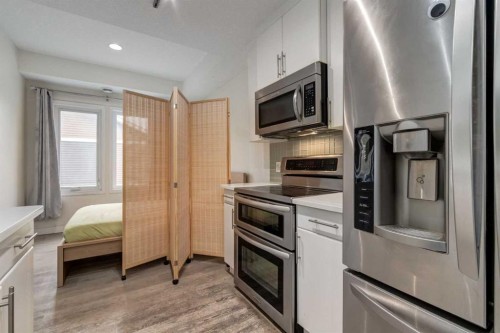 64 Auburn Bay Close Se, Calgary, AB - Indoor Photo Showing Kitchen With Stainless Steel Kitchen