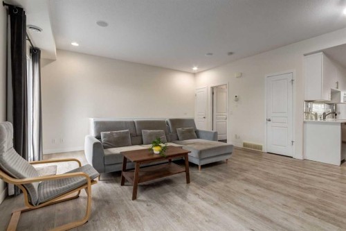64 Auburn Bay Close Se, Calgary, AB - Indoor Photo Showing Living Room