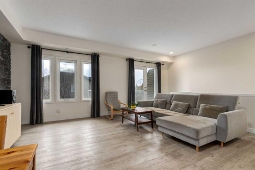 64 Auburn Bay Close Se, Calgary, AB - Indoor Photo Showing Living Room