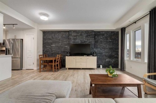 64 Auburn Bay Close Se, Calgary, AB - Indoor Photo Showing Living Room