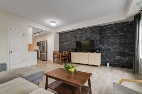 64 Auburn Bay Close Se, Calgary, AB - Indoor Photo Showing Living Room