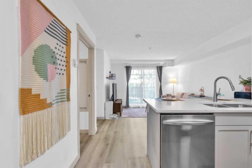 2214-175 Panatella Hill Nw, Calgary, AB - Indoor Photo Showing Kitchen With Double Sink