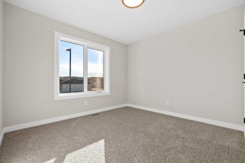 85 Quartz Crescent, Cochrane, AB - Indoor Photo Showing Other Room