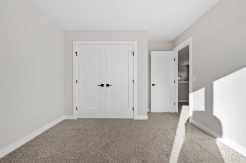 85 Quartz Crescent, Cochrane, AB - Indoor Photo Showing Other Room
