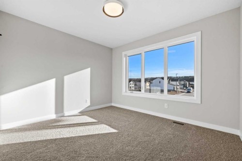 85 Quartz Crescent, Cochrane, AB - Indoor Photo Showing Other Room