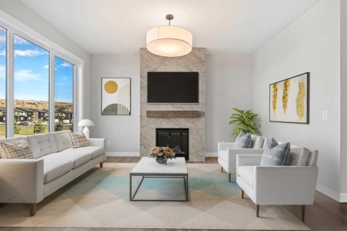 85 Quartz Crescent, Cochrane, AB - Indoor Photo Showing Living Room With Fireplace