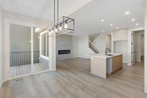 112 Belmont Place Sw, Calgary, AB - Indoor With Fireplace