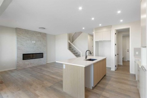 112 Belmont Place Sw, Calgary, AB - Indoor With Fireplace