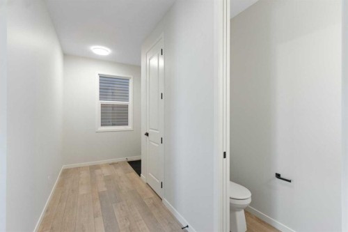 112 Belmont Place Sw, Calgary, AB - Indoor Photo Showing Other Room