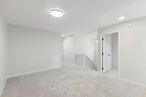 112 Belmont Place Sw, Calgary, AB - Indoor Photo Showing Other Room