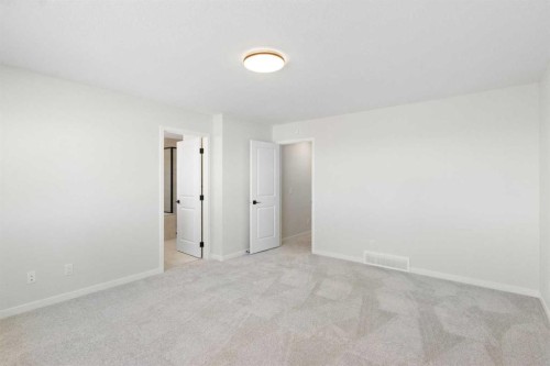 112 Belmont Place Sw, Calgary, AB - Indoor Photo Showing Other Room
