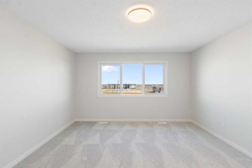 112 Belmont Place Sw, Calgary, AB - Indoor Photo Showing Other Room