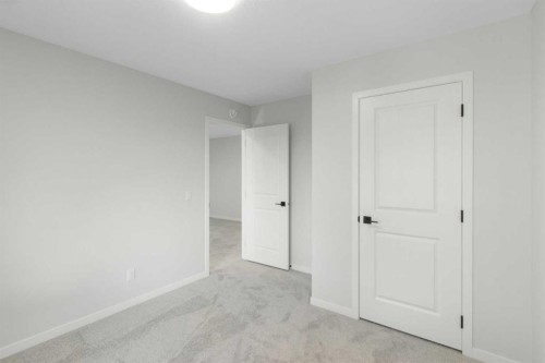 112 Belmont Place Sw, Calgary, AB - Indoor Photo Showing Other Room