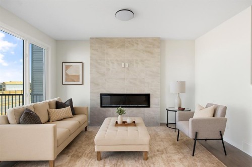 112 Belmont Place Sw, Calgary, AB - Indoor Photo Showing Living Room With Fireplace