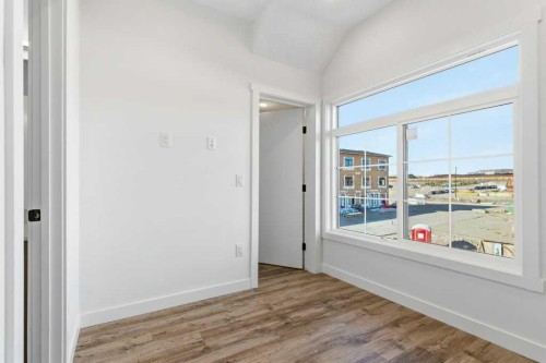 102-156 Park Street, Cochrane, AB - Indoor Photo Showing Other Room