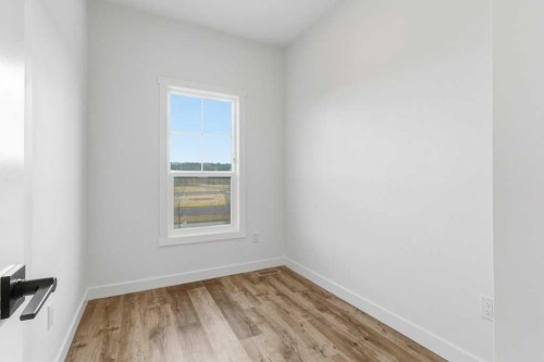 102-156 Park Street, Cochrane, AB - Indoor Photo Showing Other Room