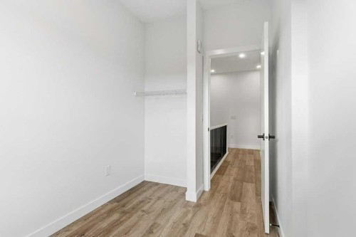 102-156 Park Street, Cochrane, AB - Indoor Photo Showing Other Room