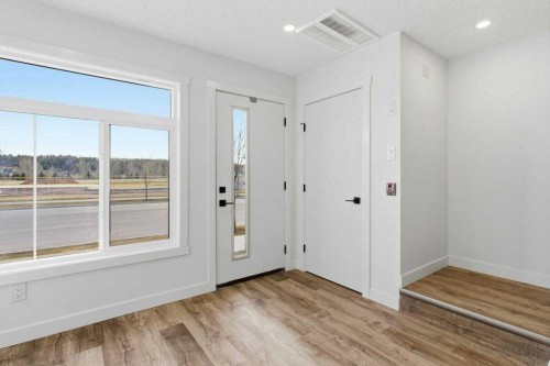 102-156 Park Street, Cochrane, AB - Indoor Photo Showing Other Room