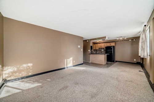 104-620 15 Avenue Sw, Calgary, AB - Indoor Photo Showing Other Room