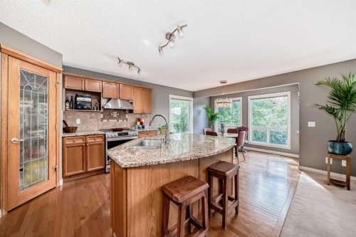73 Crestmont Drive Sw, Calgary, AB - Indoor Photo Showing Kitchen With Double Sink With Upgraded Kitchen