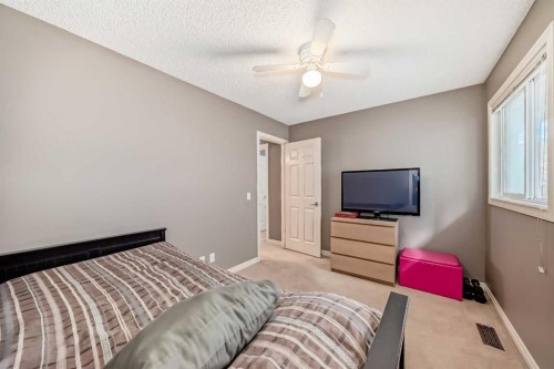73 Crestmont Drive Sw, Calgary, AB - Indoor Photo Showing Bedroom