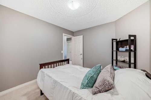 73 Crestmont Drive Sw, Calgary, AB - Indoor Photo Showing Bedroom