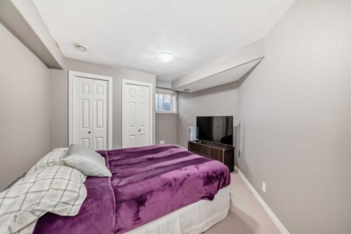 73 Crestmont Drive Sw, Calgary, AB - Indoor Photo Showing Bedroom