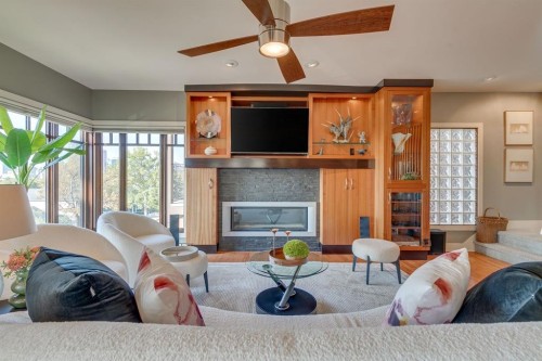 954 Drury Avenue Ne, Calgary, AB - Indoor Photo Showing Living Room With Fireplace