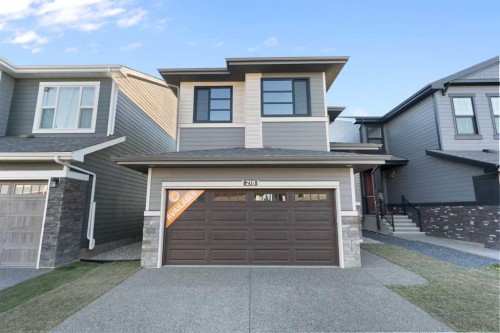 218 West Grove Lane Sw, Calgary, AB - Outdoor With Facade