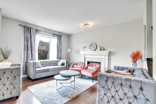 272 Skyview Shores Manor Ne, Calgary, AB - Indoor Photo Showing Living Room With Fireplace