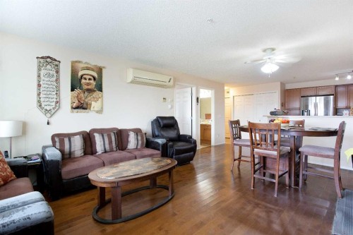 2107-5200 44 Avenue Ne, Calgary, AB - Indoor Photo Showing Living Room