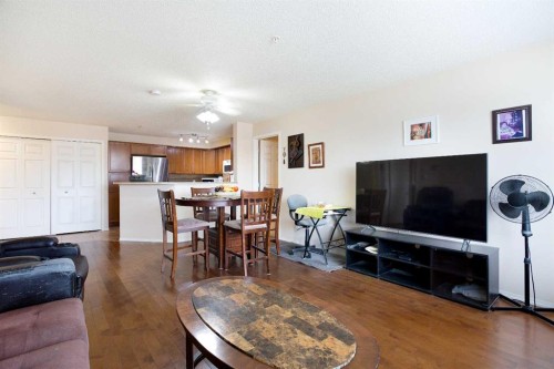 2107-5200 44 Avenue Ne, Calgary, AB - Indoor Photo Showing Living Room