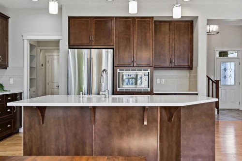 182 Cranarch Place Se, Calgary, AB - Indoor Photo Showing Kitchen With Upgraded Kitchen