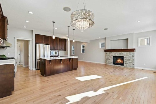 182 Cranarch Place Se, Calgary, AB - Indoor With Fireplace