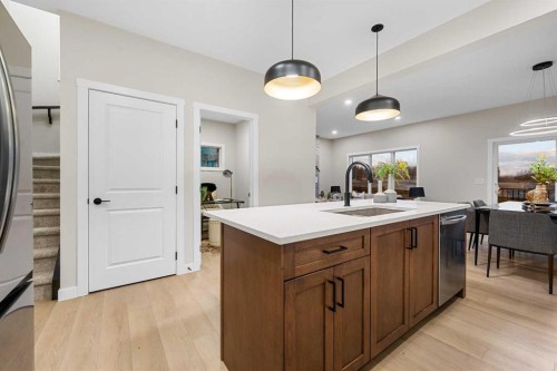 128 Versant Point Sw, Calgary, AB - Indoor Photo Showing Kitchen