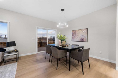 128 Versant Point Sw, Calgary, AB - Indoor Photo Showing Dining Room