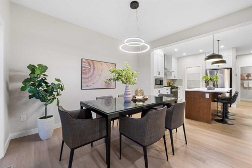 128 Versant Point Sw, Calgary, AB - Indoor Photo Showing Dining Room