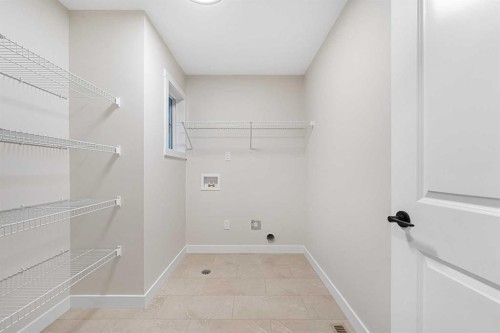 128 Versant Point Sw, Calgary, AB - Indoor With Storage