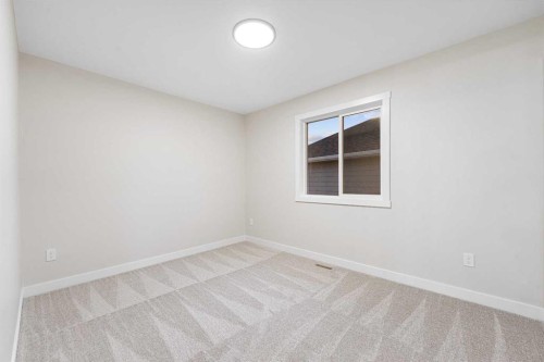128 Versant Point Sw, Calgary, AB - Indoor Photo Showing Other Room