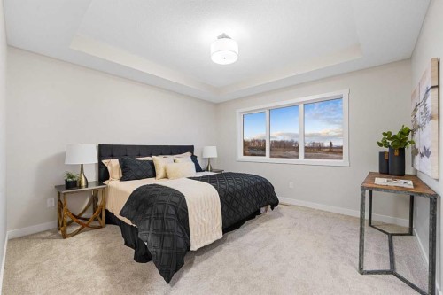 128 Versant Point Sw, Calgary, AB - Indoor Photo Showing Bedroom