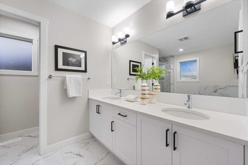 128 Versant Point Sw, Calgary, AB - Indoor Photo Showing Bathroom