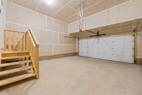 128 Versant Point Sw, Calgary, AB - Indoor Photo Showing Garage
