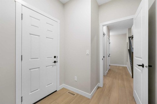128 Versant Point Sw, Calgary, AB - Indoor Photo Showing Other Room